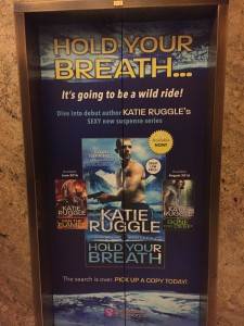 Advertising for romance author Katie Ruggle's Search and Rescue series on elevator doors at the Rio hotel