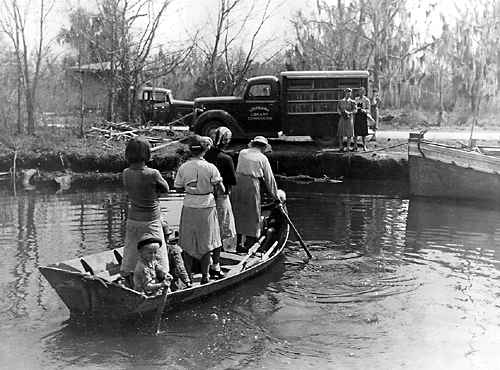 A Works Progress Administration Bookmobile visits Bayou De Large, Louisiana. Photo from the New Deal Network.