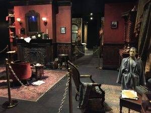 Half of the recreation of the sitting room at 221B. (Note the wax dummy with a bullet hole in its forehead.)
