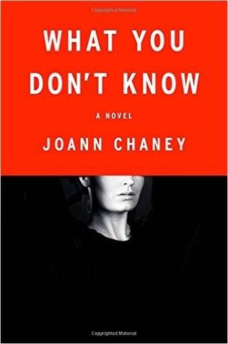 cover image: a black and white phot of a white woman faded into the black background with her eyes and forehead covered by a red background and the title of the book