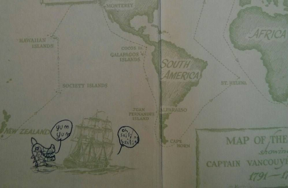 A map with a hand drawn sea monster