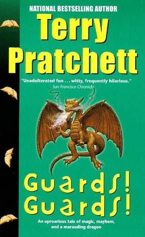 cover of Guards! Guards! by Terry Pratchett; green with a brown dragon blowing smoke