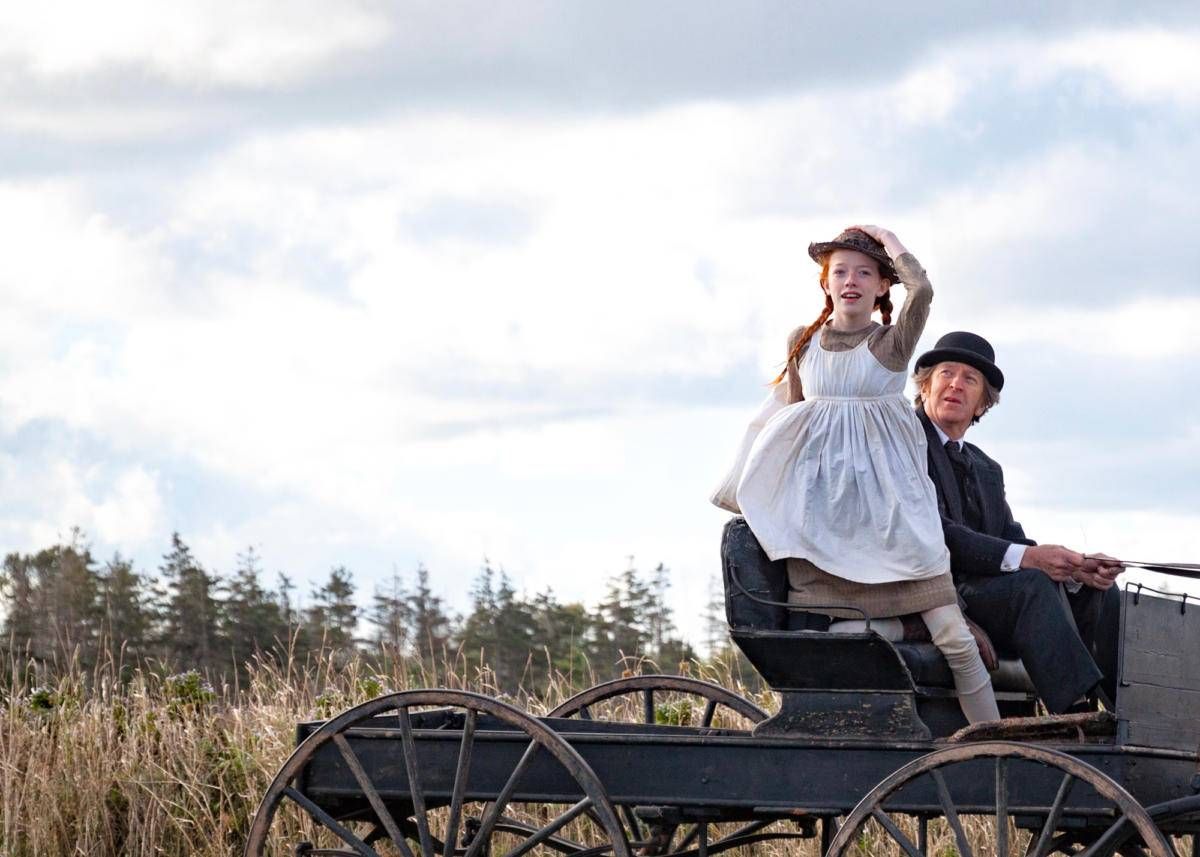 Matthew Cuthbert and Anne Shirley ride in a buggy in Netflix's Anne Of Green Gables adaptation