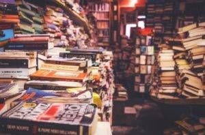 Stacks of books in a bookstore.