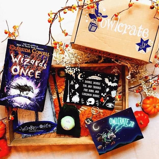 Owl crate Halloween pack with the book The Wizards of Once by Cressida Cowell and other spooky and Halloween themed knickknacks