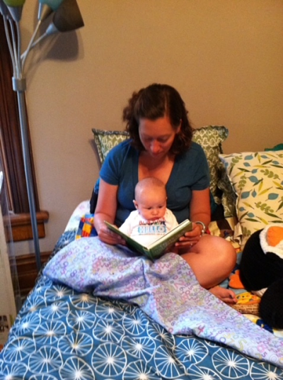 Contributor Katherine Willoughby reads with her child, shared in celebration of bookish moms for Mother's Day
