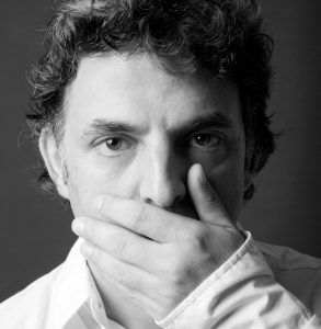 Photo of etgar keret, one of the best authors of magical realism short stories.