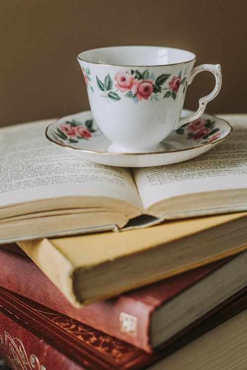 Photo of teacup on stack of books