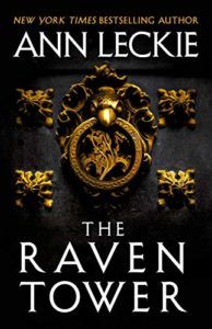 cover of The Raven Tower by Ann Leckie, showing an ornate gold door knocker against a matte black background