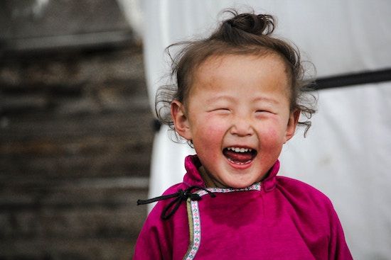 Young child laughing