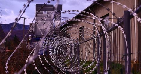 prison barbed wire dystopia feature