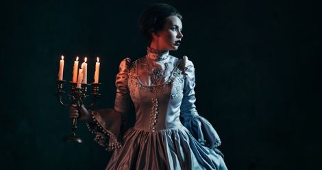 victorian woman holding candelabra historical fiction mystery thriller and crime feature