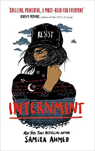 cover of Internment by Samira Ahmed; illustration of a young Brown woman in a black hat covers the bottom of her face with her black shirt