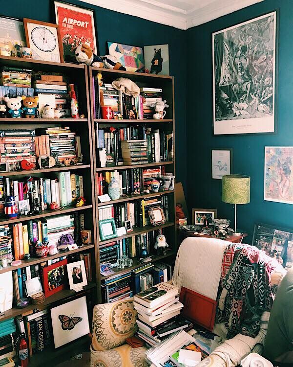A bookshelf piled with books