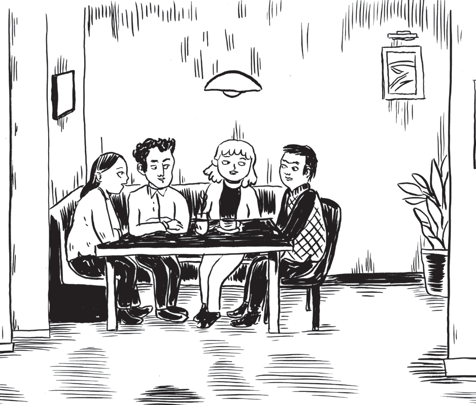 Four people seated in a restaurant booth