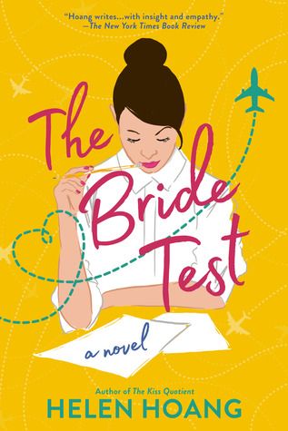 cover of The Bride Test by Helen Hoang: a brunette woman with her hair in a bun looking down at a stack of paper with a pencil in her hand