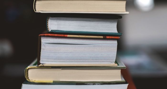 image of a stack of books https://unsplash.com/photos/MiJTU6lqksg
