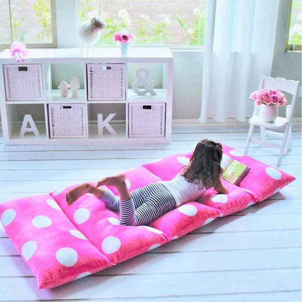 Image of child on pillow bed; promotional image from Amazon https://www.amazon.com/Butterfly-Craze-Recliner-Alternative-Included/dp/B01IFZ6AS2/ref=redir_mobile_desktop?ie=UTF8&aaxitk=DmnIhdegSUJaTZV3aIwIGA&hsa_cr_id=9397621040201&ref_=sbx_be_s_sparkle_td_asin_1