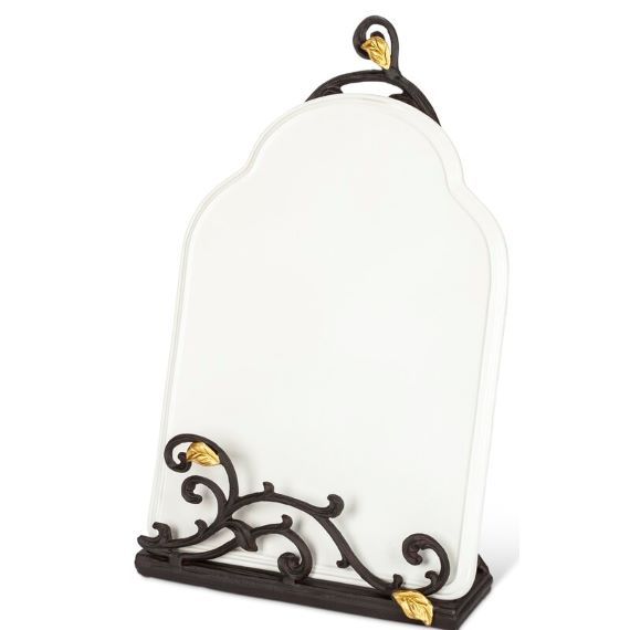 White book holder with a metal vine with gold leaves along the bottom. A vine with leaves is at the top. Link: https://secure.img1-fg.wfcdn.com/im/26019686/resize-h800-w800%5Ecompr-r85/7415/74152307/default_name.jpg
