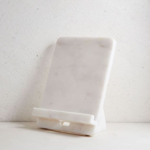 White marble cookbook stand, in front of a white background. Link: https://assets.weimgs.com/weimgs/rk/images/wcm/products/202014/0473/img25o.jpg