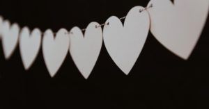 a photo of hearts on a string