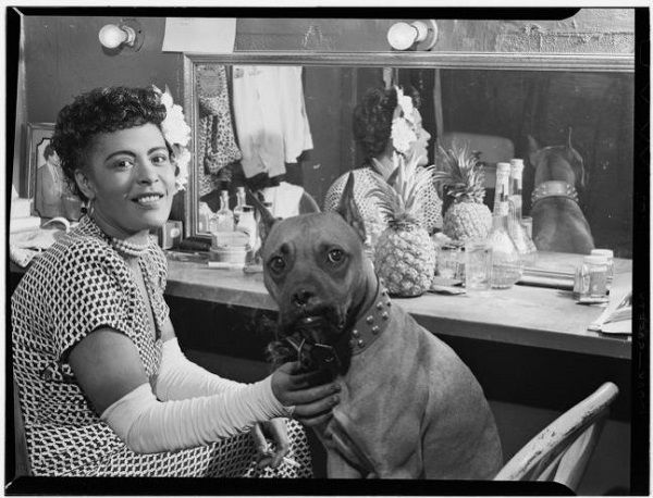 Photo of Billie Holiday and her dog Mister