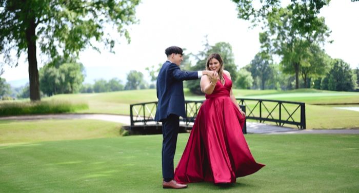 teen couple dancing for prom photo