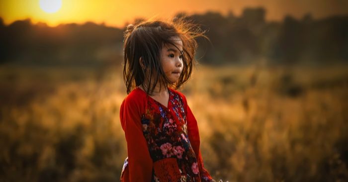 little girl outdoors in nature