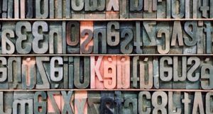 image of letterpress tiles https://unsplash.com/photos/Y6tGu-OH8lA