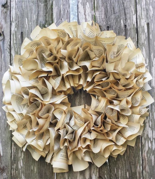Picture of scrunched paper wreath against wood planks