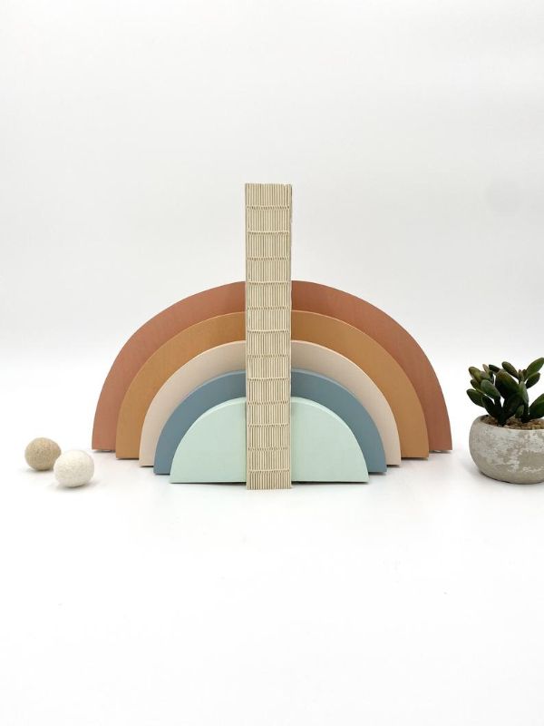 muted color rainbow bookends