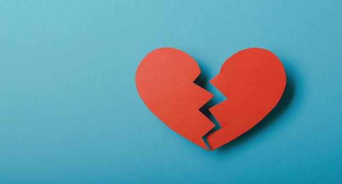 image of a red broken paper heart against a blue background https://www.pexels.com/photo/broken-paper-heart-on-blue-background-5515710/