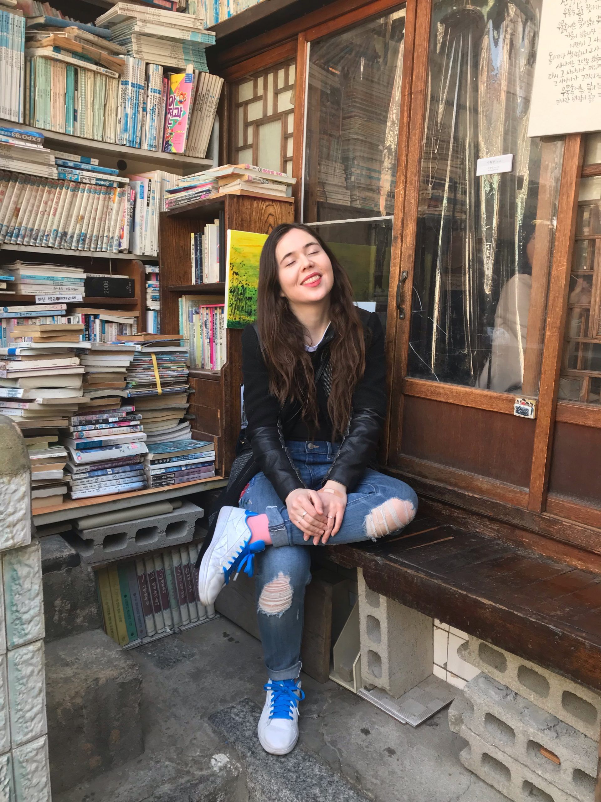 Image of article writer at Daeo bookstore in Seoul. Photo credit: Gianessa Refermat