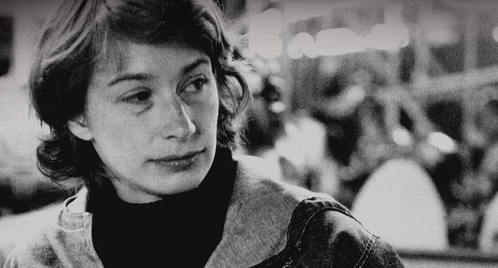 image of Mary Oliver from closeup of book cover of New and Selected Poems