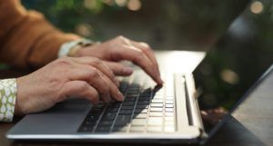 image of hands typing on a black and silver laptop computer https://www.pexels.com/photo/person-using-black-and-silver-laptop-computer-6787921/
