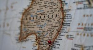 closeup of map showing Australia with a red pin