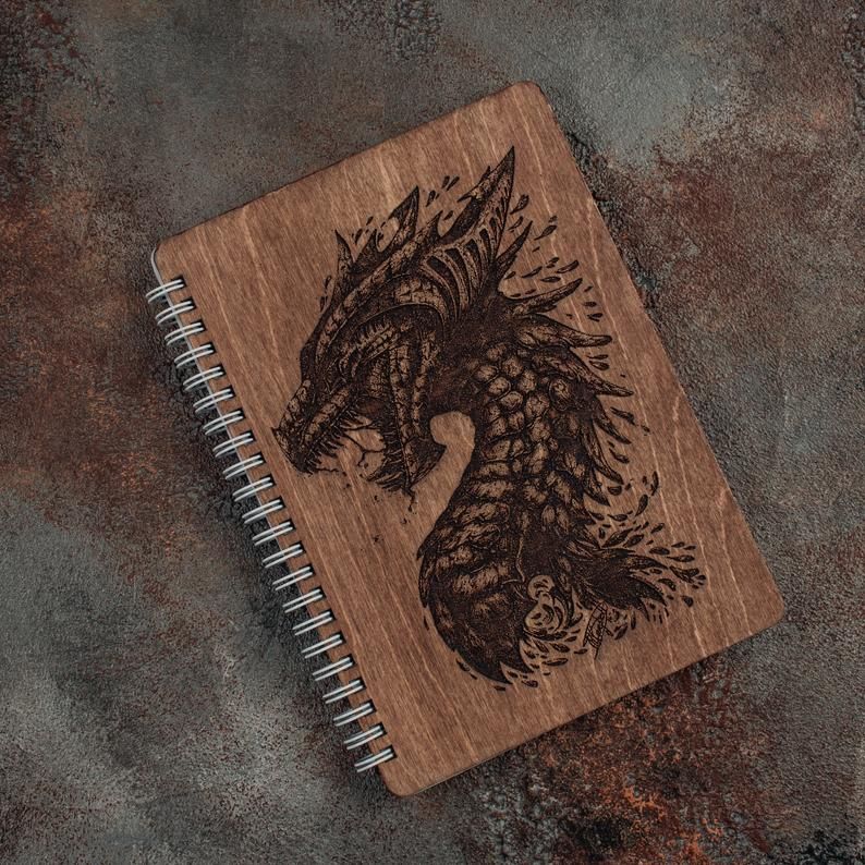 Engraved wooden dragon notebook