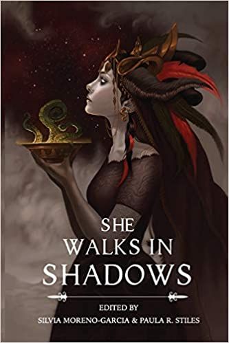 a woman with a dark dress and a feathered piece on her head. It's the cover of She Walks in Shadows