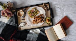 tray of food and a book