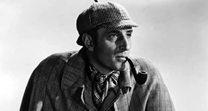 black and white image of Basil Rathbone in The Adventures of Sherlock Holmes film