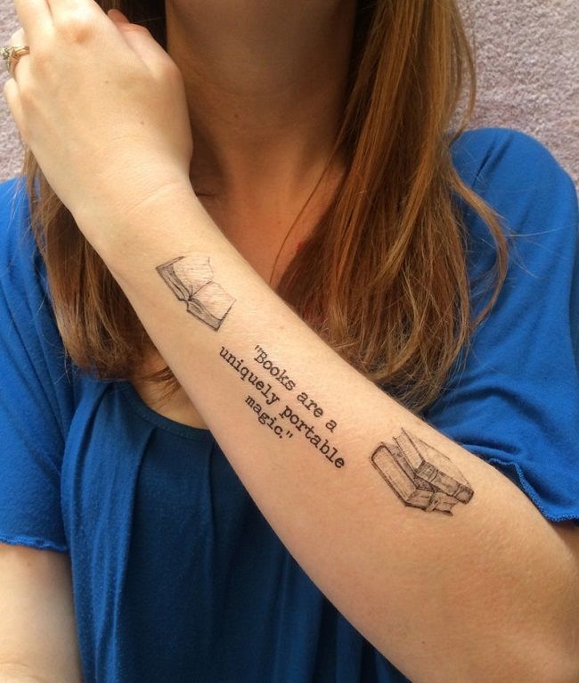 Image of a person’s arm with three temporary tattoos of an open book and a stack of books and a quote that says, “Books are a uniquely portable magic.”