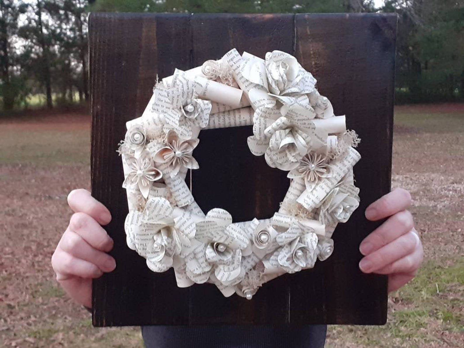Image of a wreath made of book pages. 