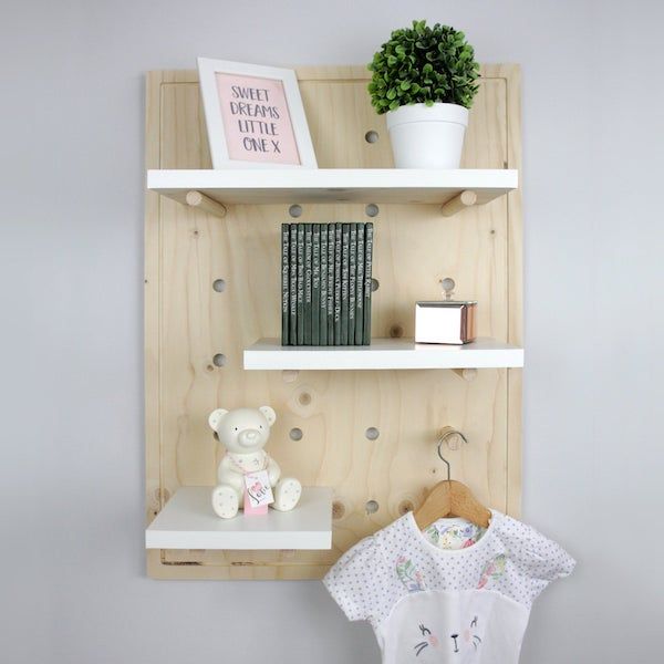 image of pegboard nursery bookshelf