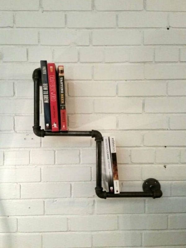 Two-layered book rack made of industrial pipes