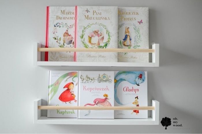Simple wooden book rack with single front rod
