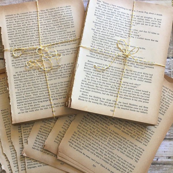 Yellowed book pages for junk journals. 