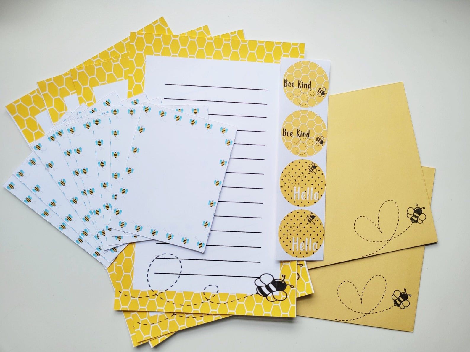 Bee-themed stationary paper, envelopes, and stickers. 