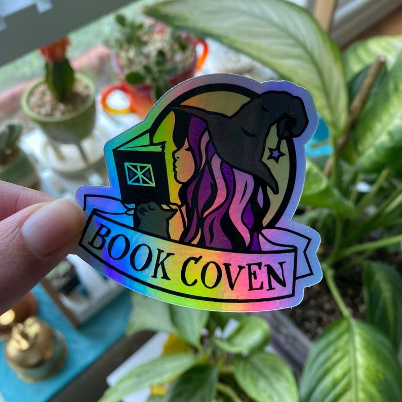 Shiny book coven sticker.