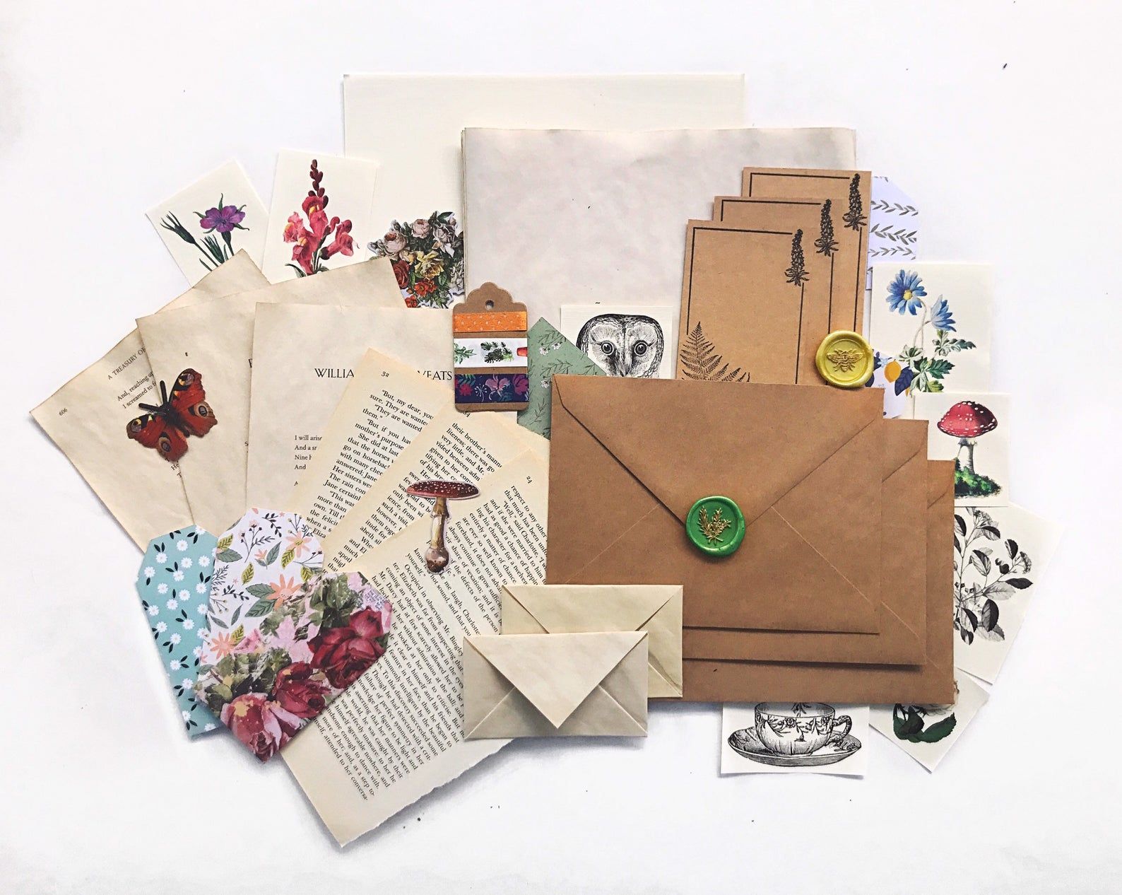 cottage core inspired stationary kit, including paper, envelopes, and stickers