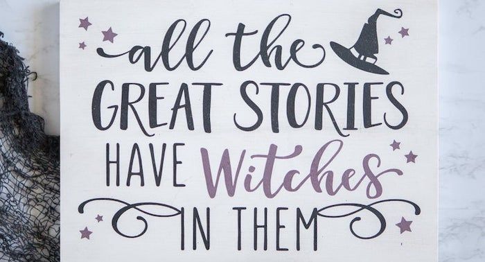 Cropped image of sign reading "all the great stories have witches in them."